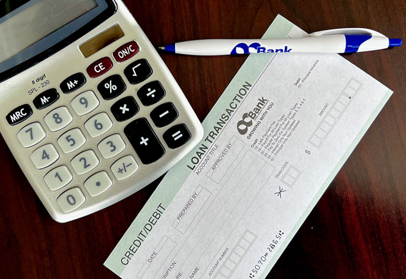A calculator and a credit ticket
