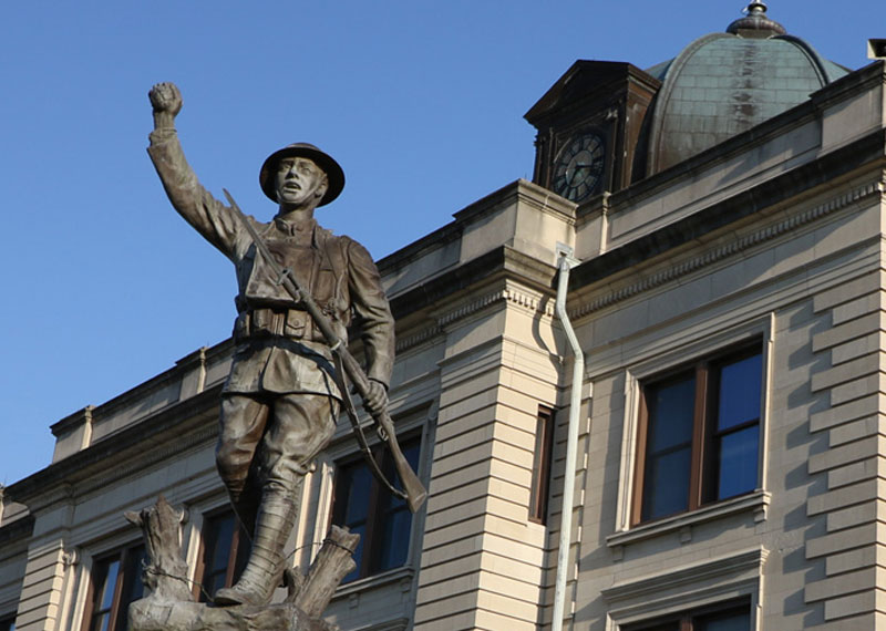 Statue in front of an old building